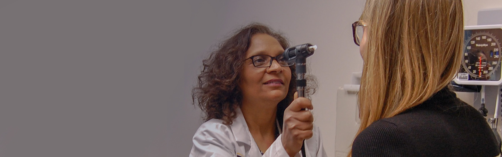 Expert Care Close to Home: Doctor checking a patient