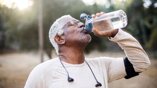 Man drinking from water bottle