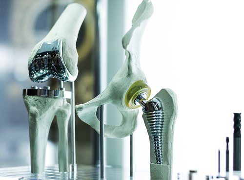 Metal and plastic hip and knee replacement parts