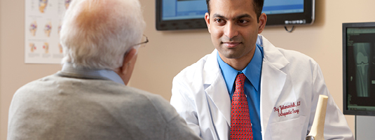 doctor speaking to patient