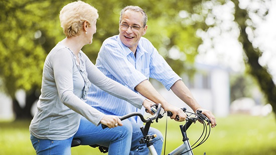man and woman on bikes