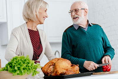 Senior Couple Preparing Dinner