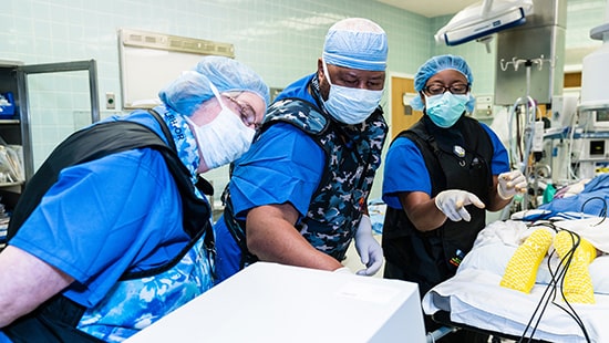 Medical staff mid operation