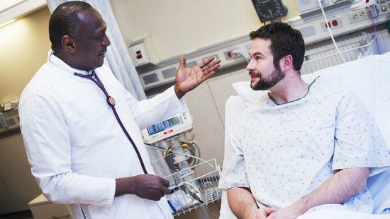 Doctor consults patient