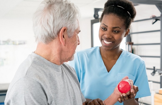 woman helping man with arm weights