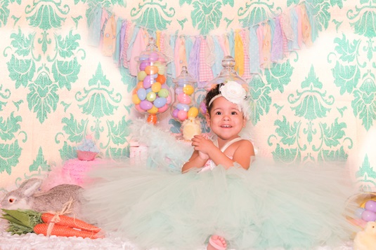 photo of Kayleigh at her first birthday smiling and healthy