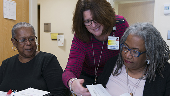 Diabetes prevention counselor chats with students