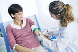 woman having blood drawn