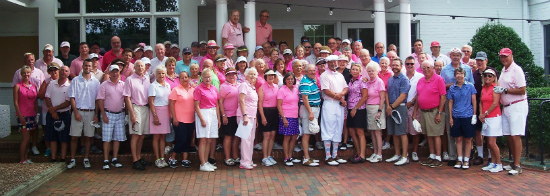 Golfers line up for picture during the golf tournament