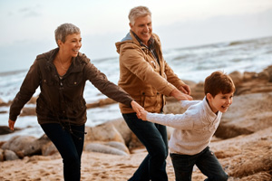 Child is playing with grand parents
