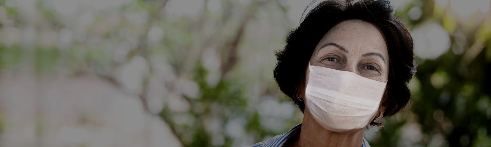 Woman wearing mask outside