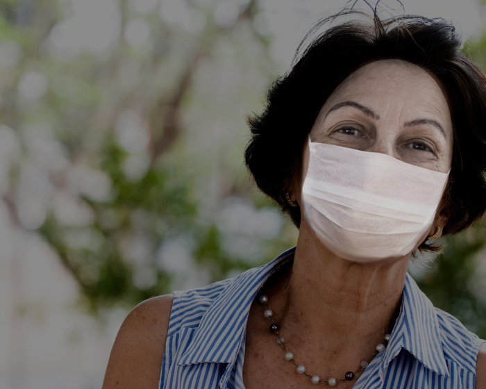Woman wearing mask outside