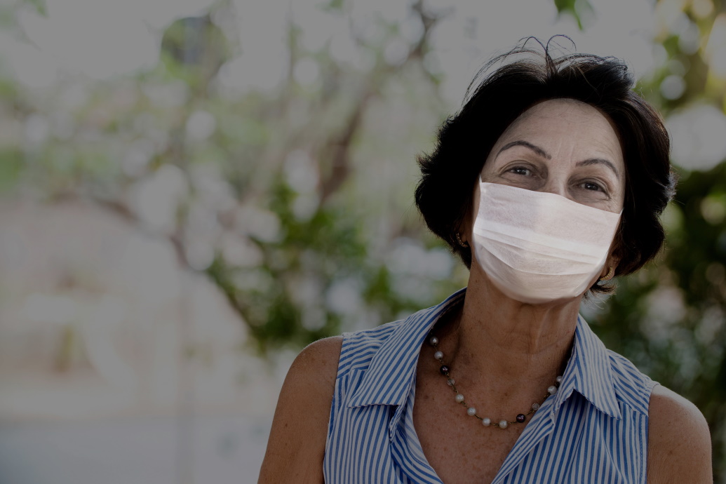 Woman wearing mask outside