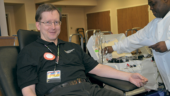 A person donates blood at a University of Maryland Medical Center blood drive