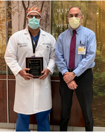 Samuel Galvagno, DO receiving Attending Physician of the Year