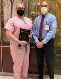 Jesse Shriki, DO receiving Fellow Physicians of the Year