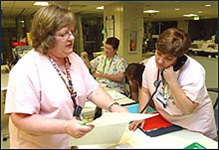 Caretakers working in PACU